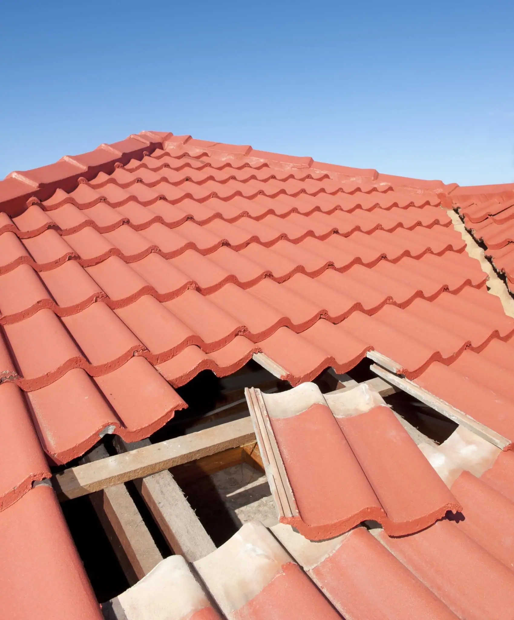 Storm-damaged Arizona roof being assessed for an insurance claim